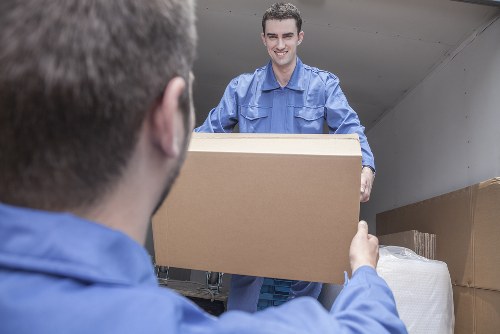 Storage worker assessing safety conditions in a warehouse area