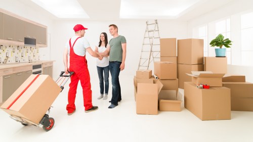 Careful packing materials and boxes prepared for relocation in Harmondsworth