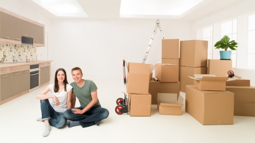 Professional local removals team handling furniture in Harmondsworth