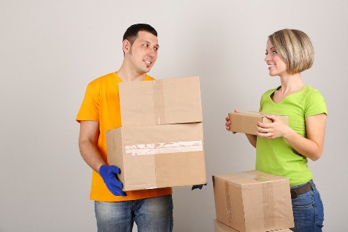 Staff member following safe procedures around storage equipment